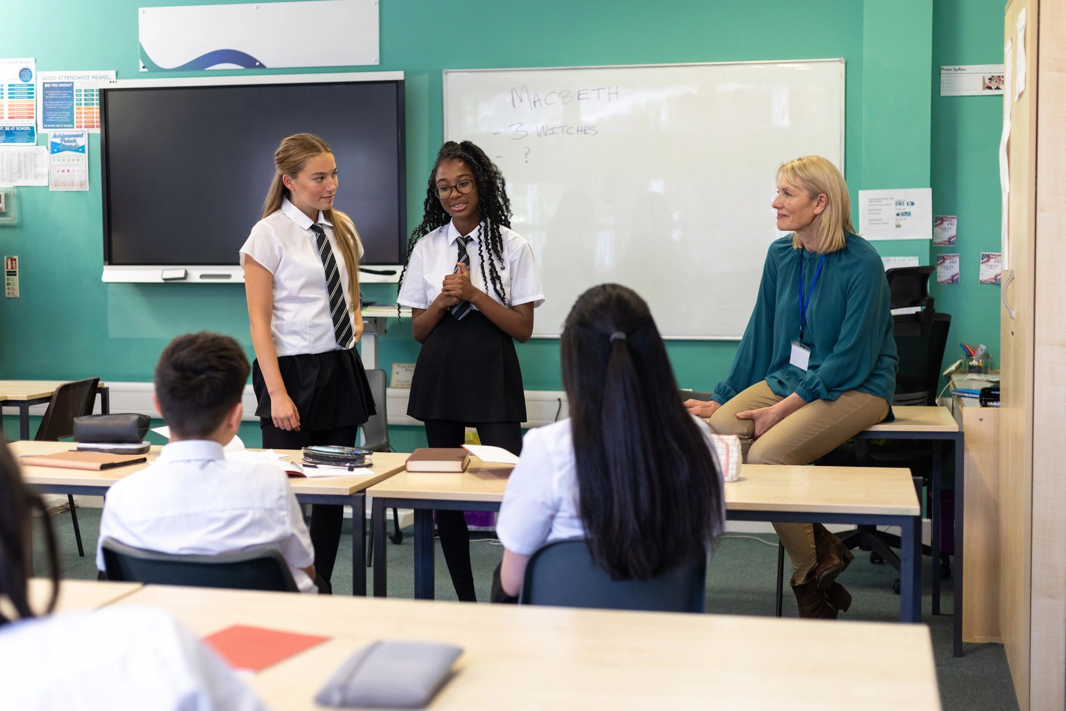 Students and teacher gathered in a classroom